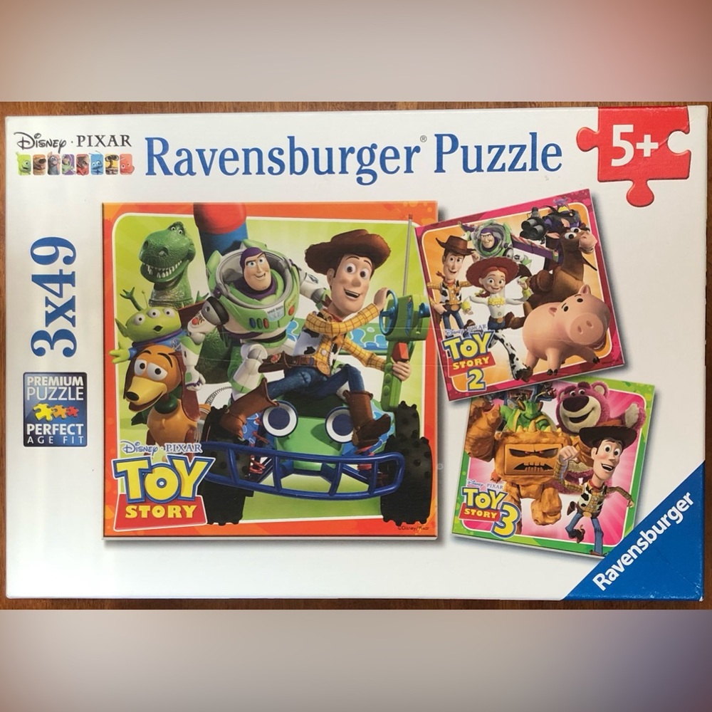 Ravensburger “The History of Toy Story” 3 X 49 Piece Puzzles.